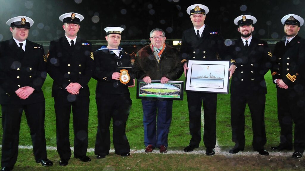 GLOVERS WELCOME HMS SOMERSET TO HUISH PARK