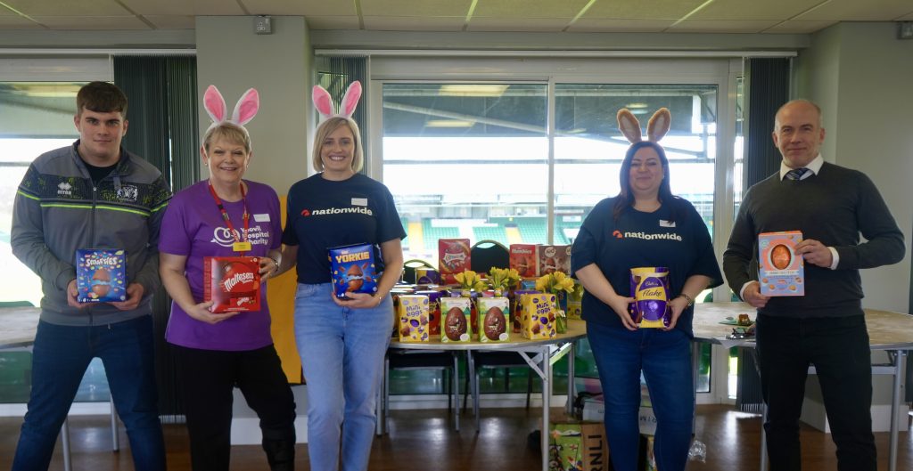 COMMUNITY | Football Club donate Easter Eggs to spread cheer at Dementia Cafe
